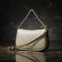 Michael Kors guldfärgad tygväska