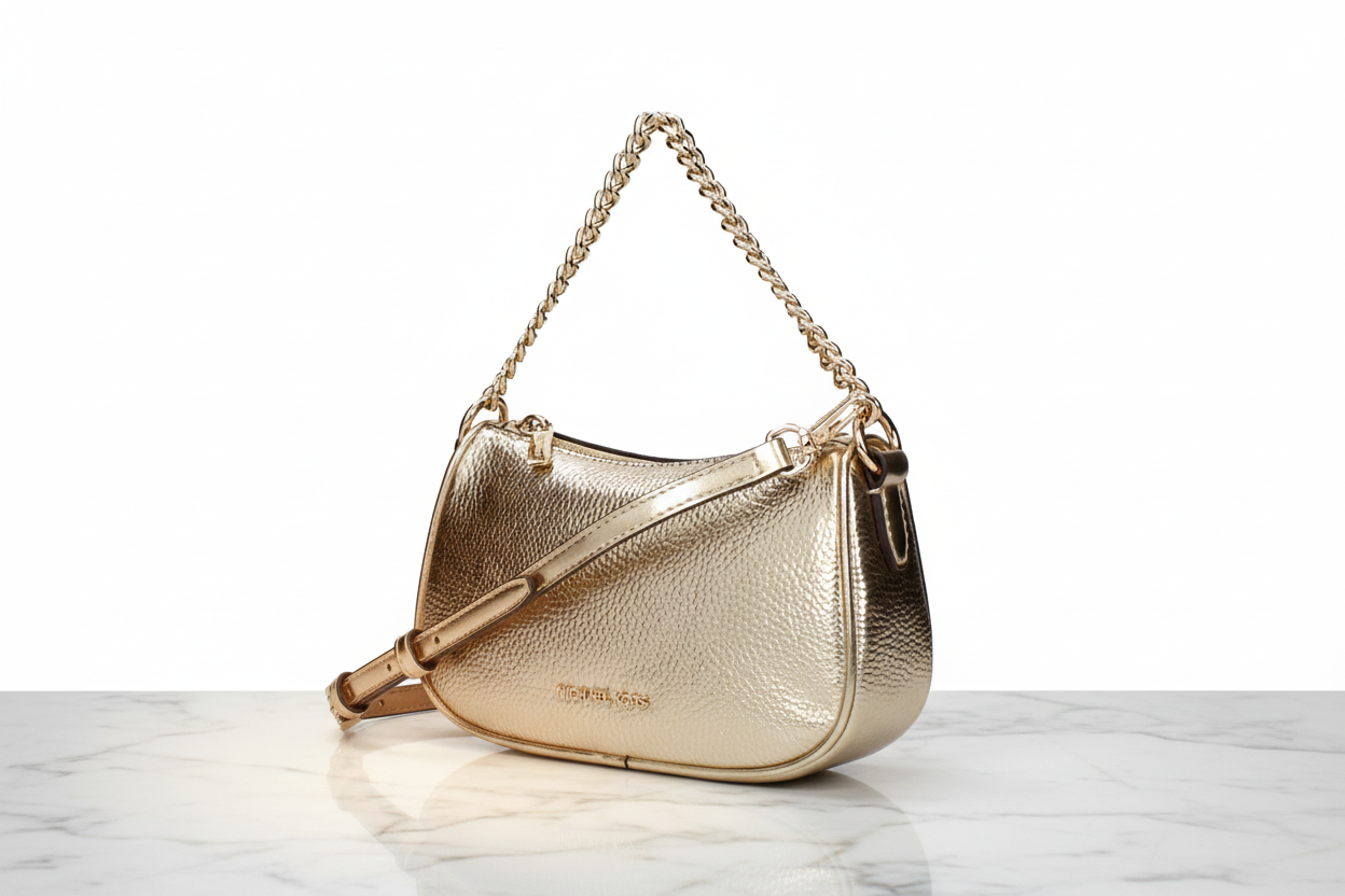 Michael Kors guldfärgad läderhandväska