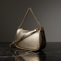 Michael Kors guldfärgad läderhandväska