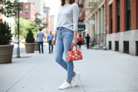 Michael Kors orange tygväska